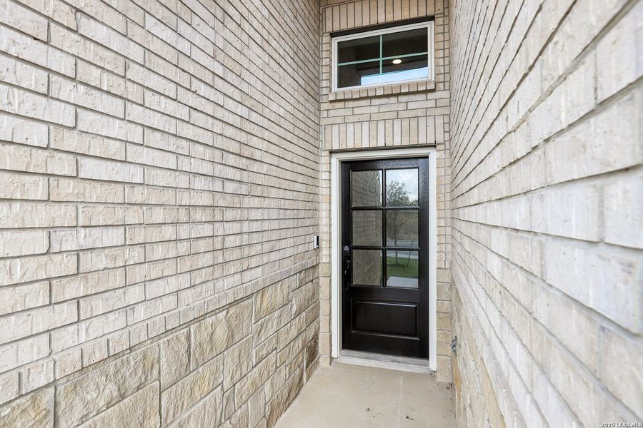Exterior details and patio area of a home in Stream Waters, Seguin (Image 17).