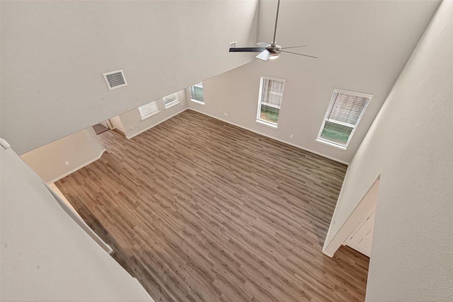 Spacious, unfurnished interior of a new home in Sunterra, Katy (Image 40).