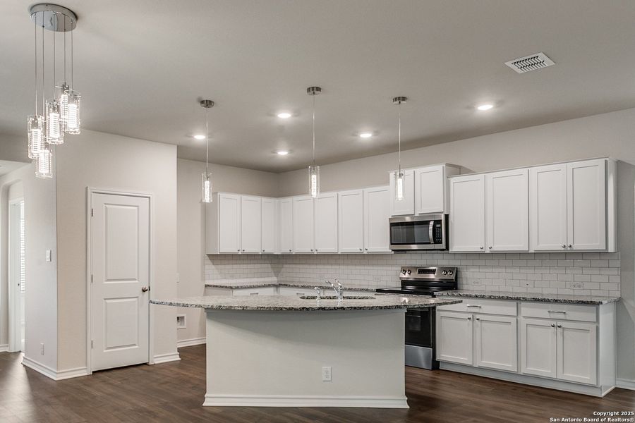 Furnished interior view inside a new home in The Canyons at Amhurst, San Antonio (Image 9). Furnished interior view inside a new home in The Canyons at Amhurst, San Antonio (Image 9).