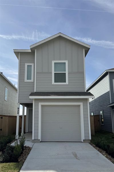 Front exterior of a new home in Sila, Huffman, TX, highlighting curb appeal (Image 23). Front exterior of a new home in Sila, Huffman, TX, highlighting curb appeal (Image 23).
