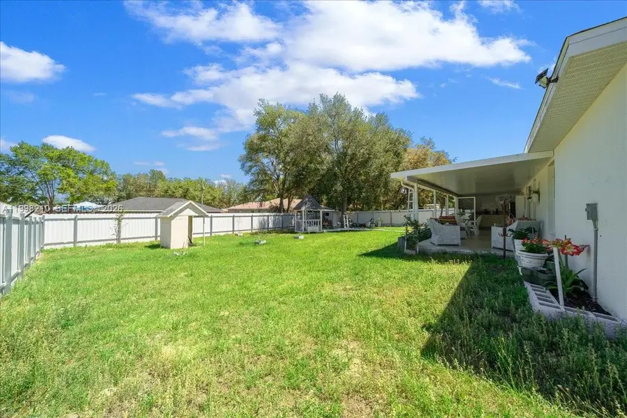 Exterior details and patio area of a home in , Ocala (Image 3).