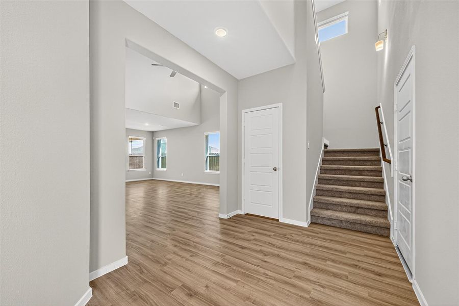 Spacious, unfurnished interior of a new home in Sunterra, Katy (Image 13).