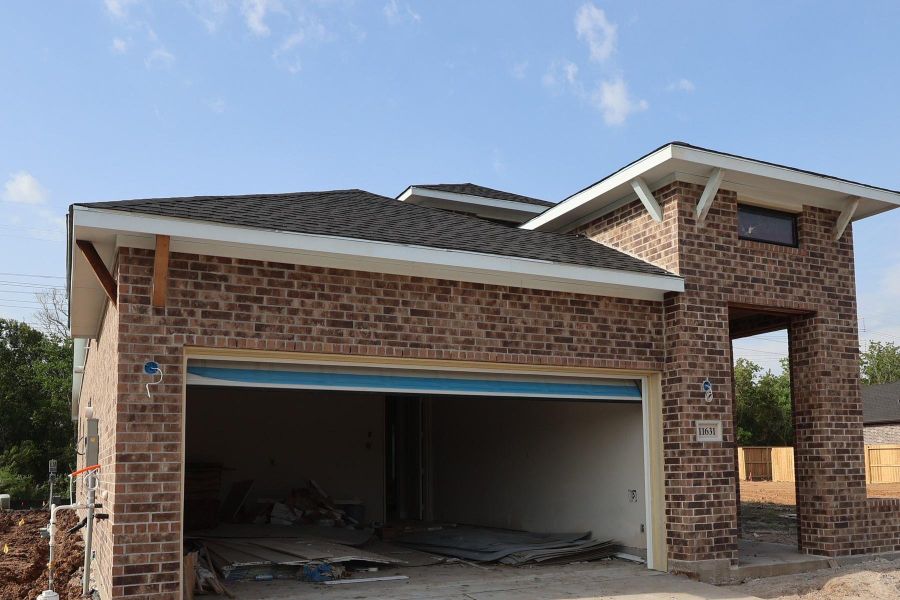 In-progress construction of a new home in Sienna - Grove Collection, Missouri City, TX (Image 12).