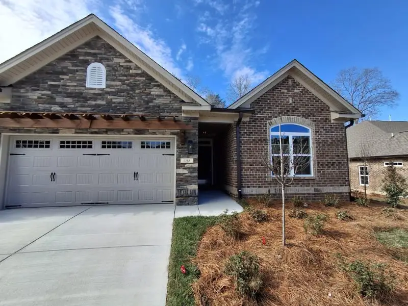 Front exterior of a new home in Weybridge, Burlington, NC, highlighting curb appeal (Image 2). Front exterior of a new home in Weybridge, Burlington, NC, highlighting curb appeal (Image 2).