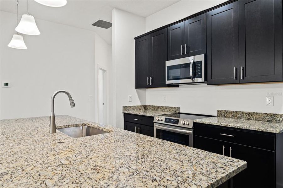 Furnished interior view inside a new home in , Weeki Wachee (Image 32).