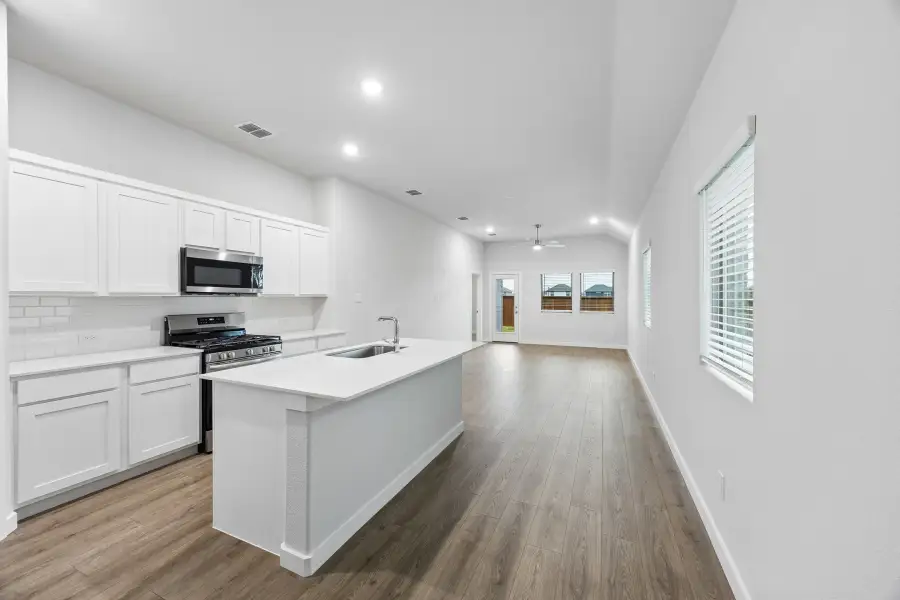 Kitchen in the Cedar home plan by Trophy Signature Homes – REPRESENTATIVE PHOTO Kitchen in the Cedar home plan by Trophy Signature Homes – REPRESENTATIVE PHOTO