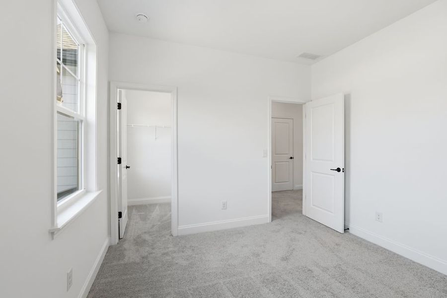 Representative unfurnished interior of a home built from the Stockbridge by Taylor Morrison in Watson Park, Snellville (Image 38).