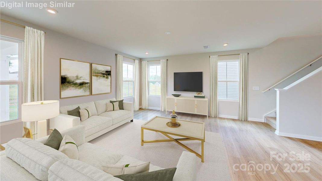 This spacious great room is filled with natural light and perfect for gatherings. Its open-concept layout keeps everyone connected—whether you're relaxing or chatting from the kitchen, the conversation flows effortlessly. This spacious great room is filled with natural light and perfect for gatherings. Its open-concept layout keeps everyone connected—whether you're relaxing or chatting from the kitchen, the conversation flows effortlessly.