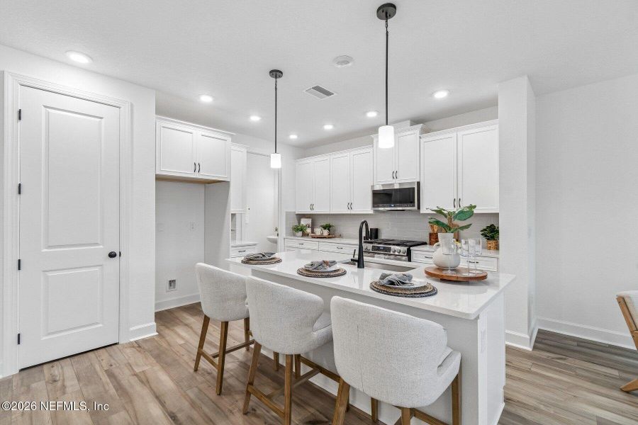 Furnished interior view inside a new home in Westerly Park at Wildlight - Courtyard Collection, Yulee (Image 16).