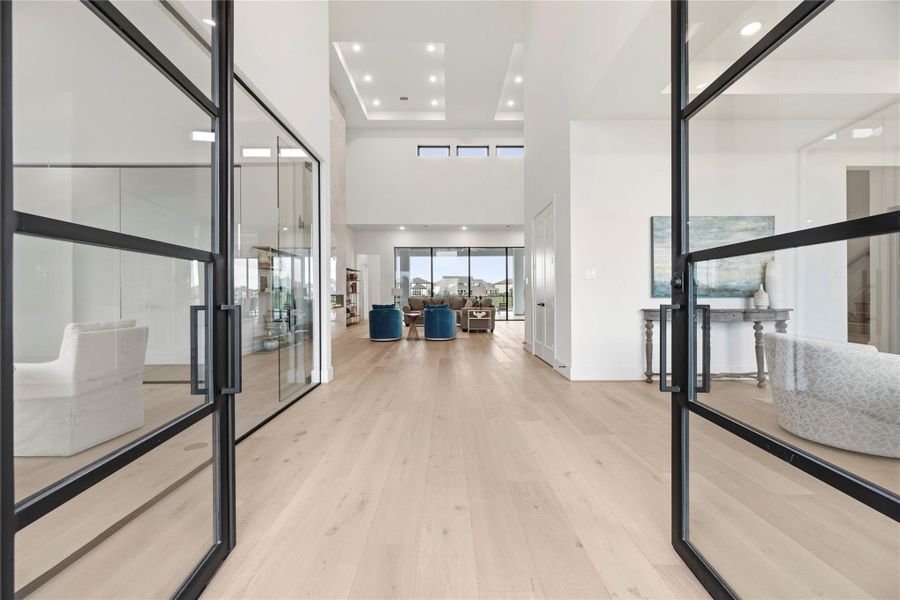 Bright entry with high ceilings and glass-framed doors that let in plenty of natural light. Bright entry with high ceilings and glass-framed doors that let in plenty of natural light.