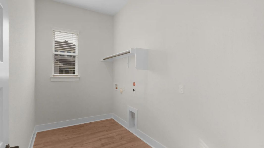 Spacious, unfurnished interior of a new home in The Grove at Blackhawk, Pflugerville (Image 14).