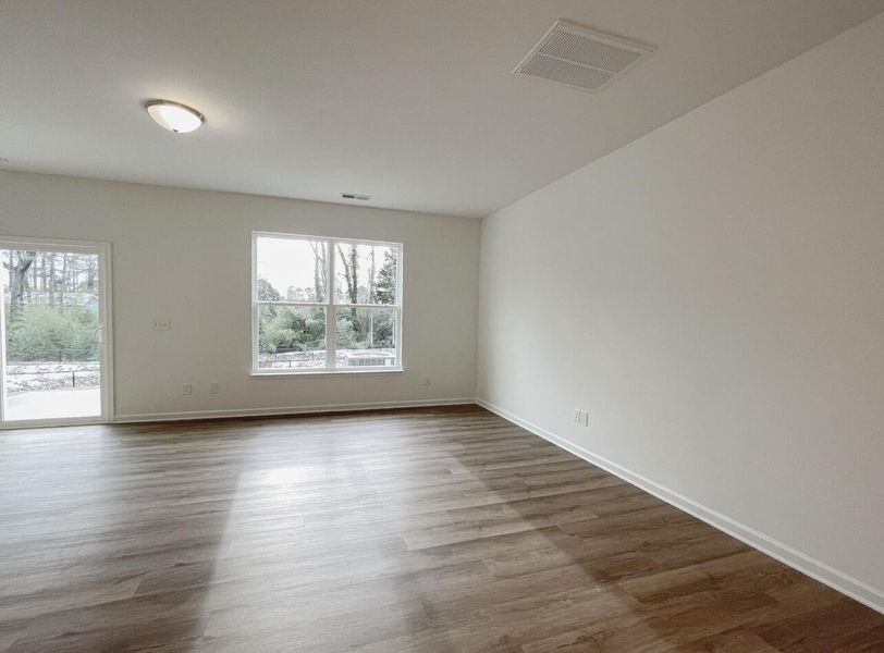 Spacious, unfurnished interior of a new home in East Main Townes, Spartanburg (Image 17).