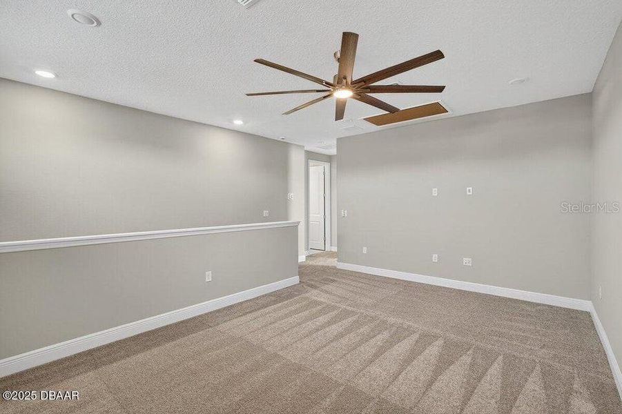 Spacious, unfurnished interior of a new home in Legends Preserve - Reserve Series, Daytona Beach (Image 41). Spacious, unfurnished interior of a new home in Legends Preserve - Reserve Series, Daytona Beach (Image 41).