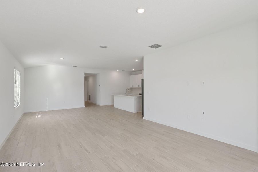 Spacious, unfurnished interior of a new home in Flagler Village - Signature Series, Palm Coast (Image 18). Spacious, unfurnished interior of a new home in Flagler Village - Signature Series, Palm Coast (Image 18).