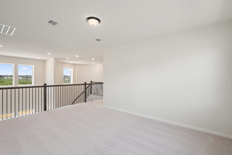 Spacious, unfurnished interior of a new home in Wolf Ranch, Georgetown (Image 40).