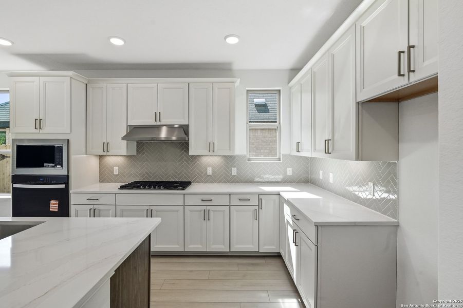Furnished interior view inside a new home in Davis Ranch, San Antonio (Image 14).
