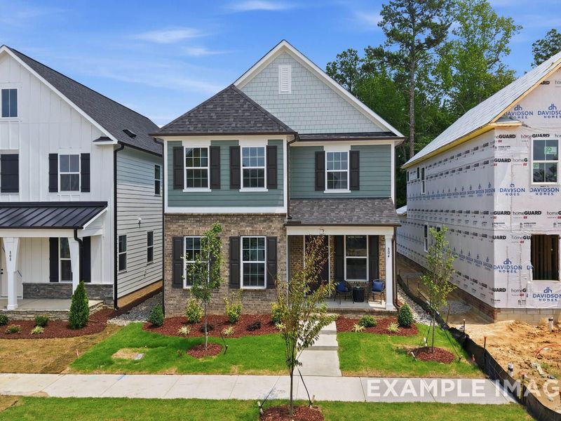 Front exterior of a new home in Forestville Yard, Knightdale, NC, highlighting curb appeal (Image 25). Front exterior of a new home in Forestville Yard, Knightdale, NC, highlighting curb appeal (Image 25).