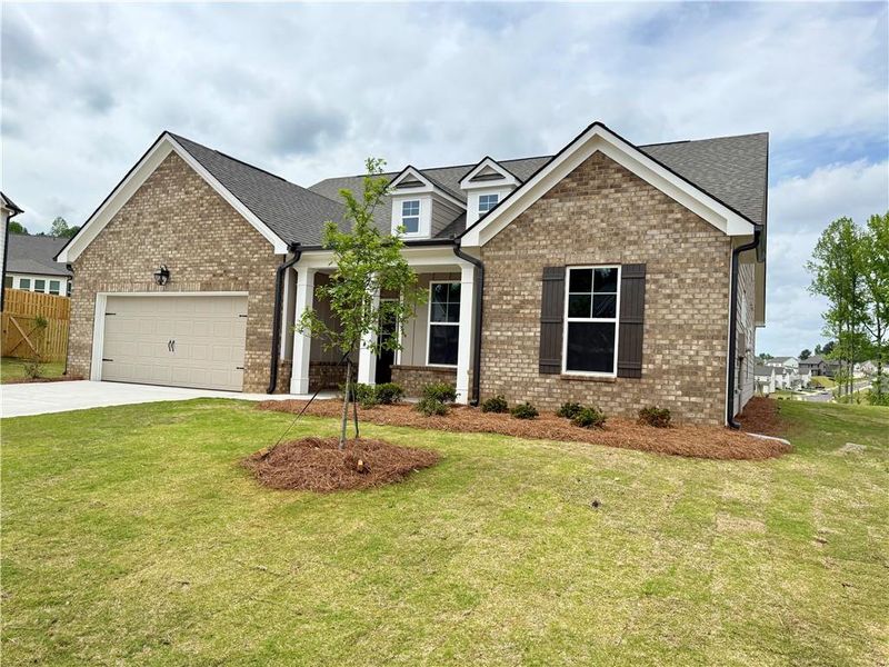 Front exterior of a new home in Ponderosa Farms Reserve, Gainesville, GA, highlighting curb appeal (Image 28).