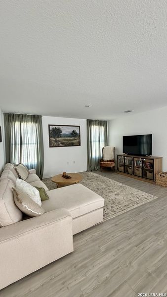 Furnished interior view inside a new home in Mission del Lago, San Antonio (Image 7).