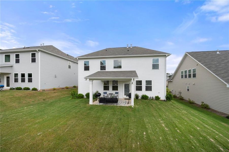 Front exterior of a new home in Avenbrook, Mableton, GA, highlighting curb appeal (Image 18).