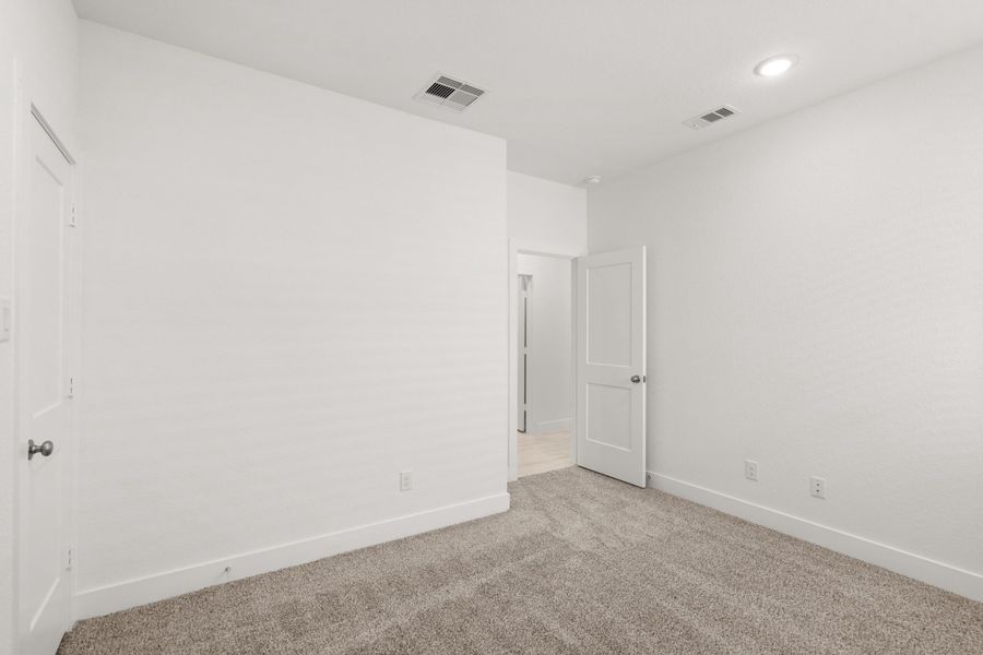 Spacious, unfurnished interior of a new home in Meridiana, Manvel (Image 32).