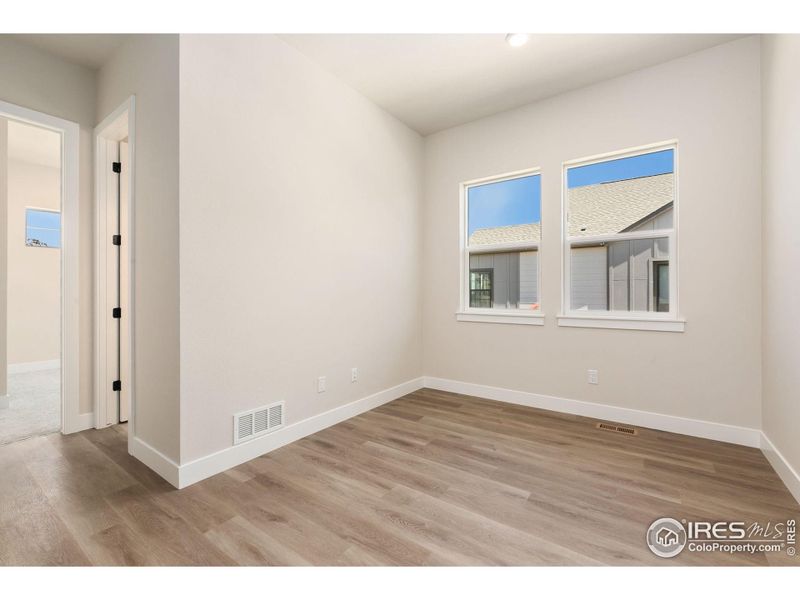 Spacious, unfurnished interior of a new home in Festival at RainDance, Windsor (Image 11).