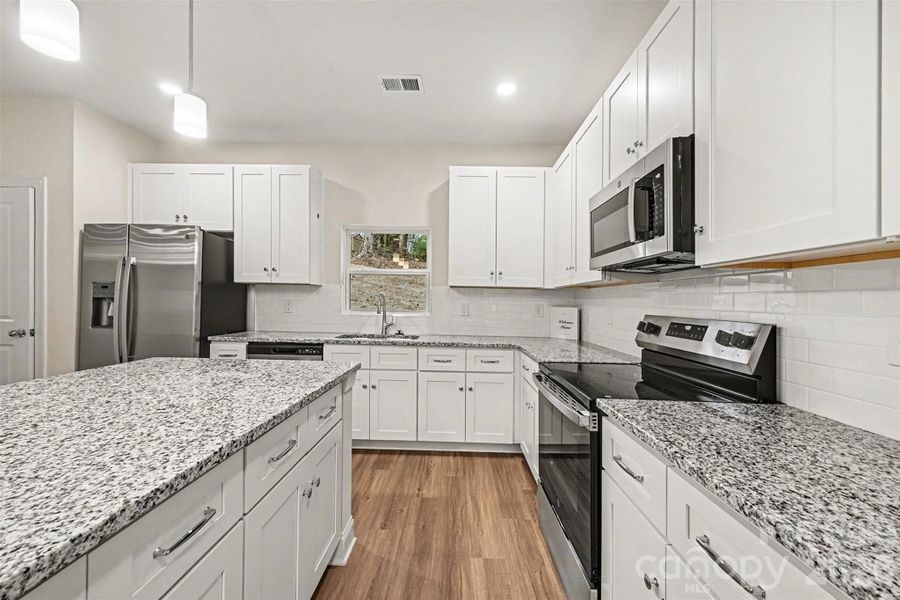 Furnished interior view inside a new home in , Newton (Image 15).