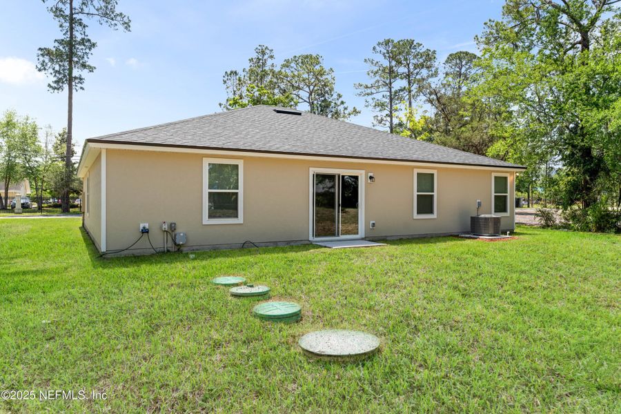 Front exterior of a new home in , Jacksonville, FL, highlighting curb appeal (Image 19). Front exterior of a new home in , Jacksonville, FL, highlighting curb appeal (Image 19).