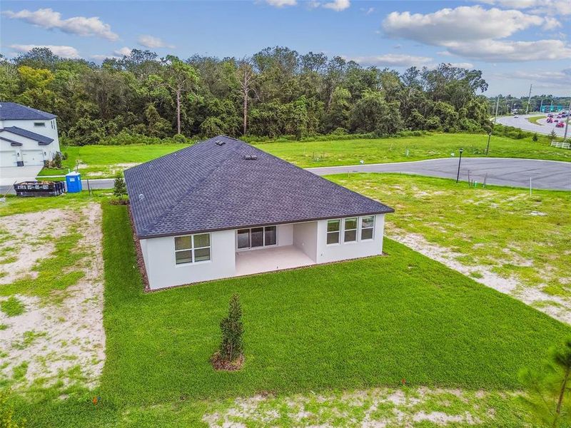 Front exterior of a new home in Hidden Ridge, New Port Richey, FL, highlighting curb appeal (Image 31). Front exterior of a new home in Hidden Ridge, New Port Richey, FL, highlighting curb appeal (Image 31).