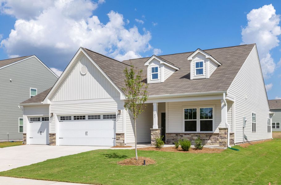 Front exterior of a new home in Benson Village, Benson, NC, highlighting curb appeal (Image 2). Front exterior of a new home in Benson Village, Benson, NC, highlighting curb appeal (Image 2).