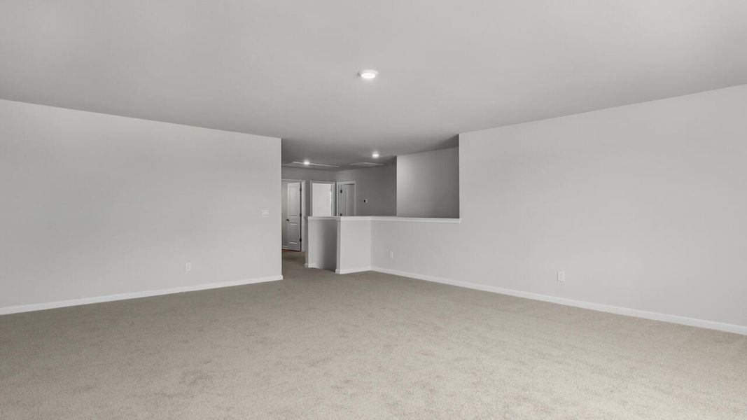 Spacious, unfurnished interior of a new home in Surfside Landing, Hubert (Image 23).