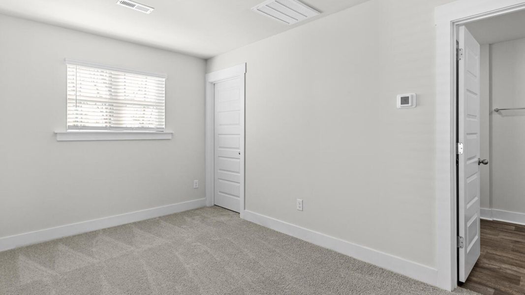 Spacious, unfurnished interior of a new home in Townes at Seabrooke, Leland (Image 25).