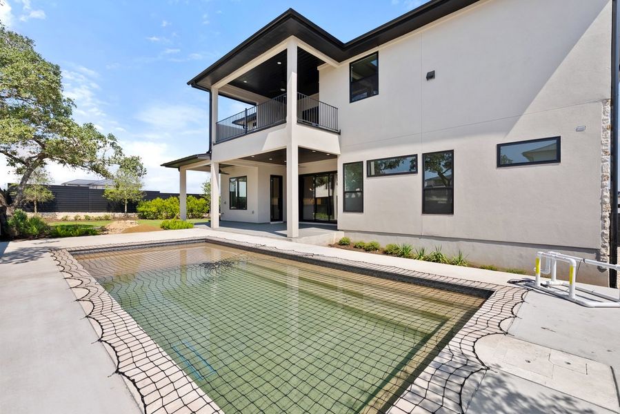 Front exterior of a new home in Milky Way at River Place, Austin, TX, highlighting curb appeal (Image 20).
