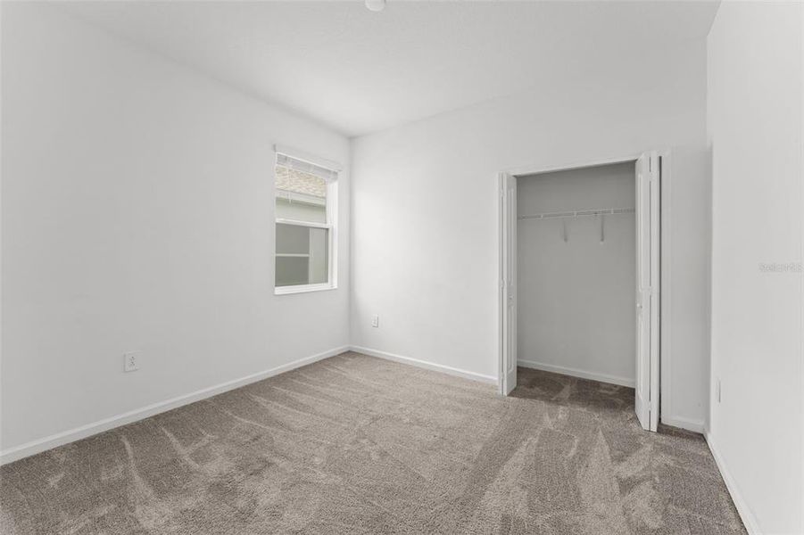 Spacious, unfurnished interior of a new home in Peace Creek Reserve, Winter Haven (Image 30).