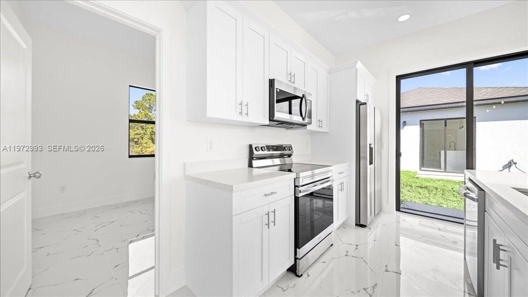 Furnished interior view inside a new home in , Lehigh Acres (Image 13).