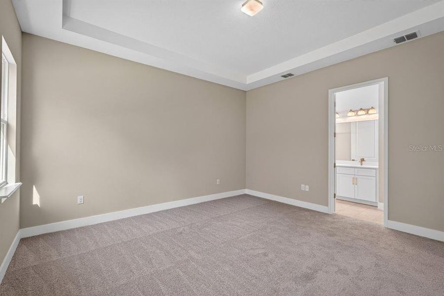 Spacious, unfurnished interior of a new home in Gray Hawk at Hole Two, Daytona Beach (Image 43).