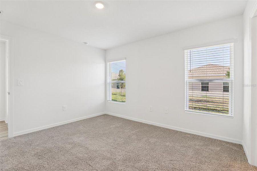 Spacious, unfurnished interior of a new home in Villamar, Winter Haven (Image 16).