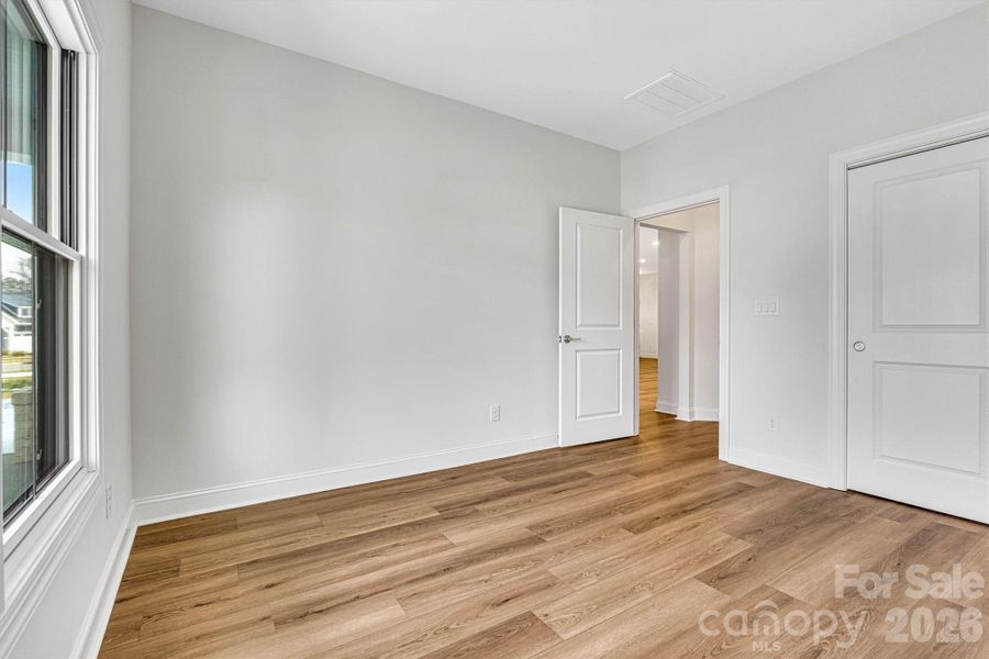 Spacious, unfurnished interior of a new home in The Courtyards at Lake Davidson, Mooresville (Image 37).