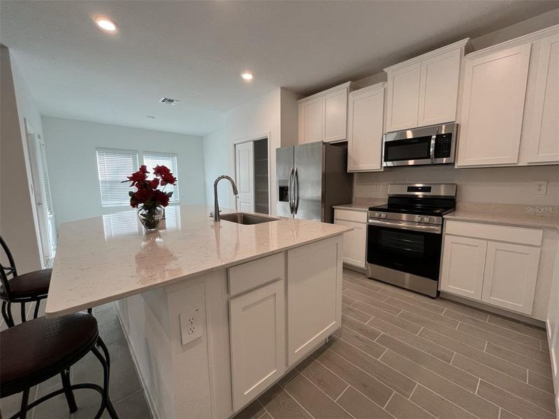 Furnished interior view inside a new home in Grand Park North, Dunnellon (Image 5).