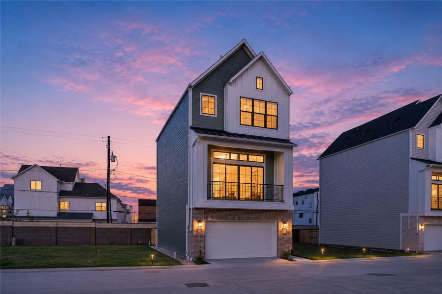 Front exterior of a new home in , Houston, TX, highlighting curb appeal (Image 14).