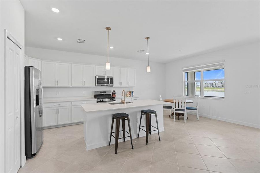 Furnished interior view inside a new home in Tuckers Cove: Villas, Punta Gorda (Image 9).