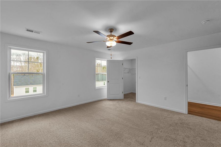 This airy room offers comfort and abundant natural This airy room offers comfort and abundant natural