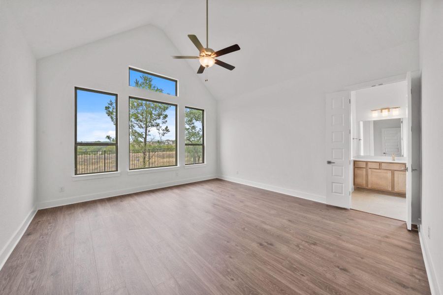 Primary Bedroom with elevated ceiling