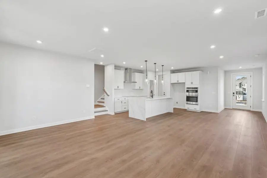 Spacious, unfurnished interior of a new home in Summit At Homestead, Chapel Hill (Image 9).