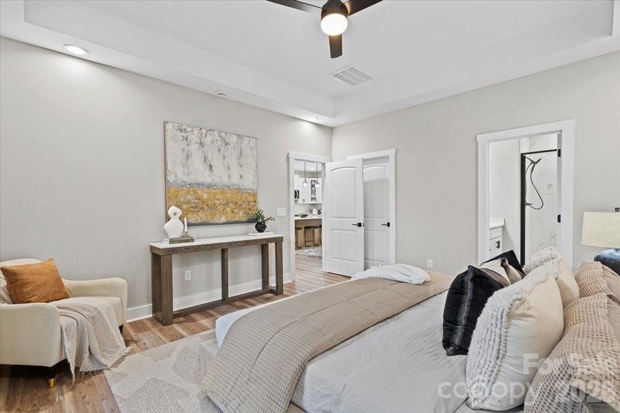 Photo of nearly identical home so you can see the space with furniture.