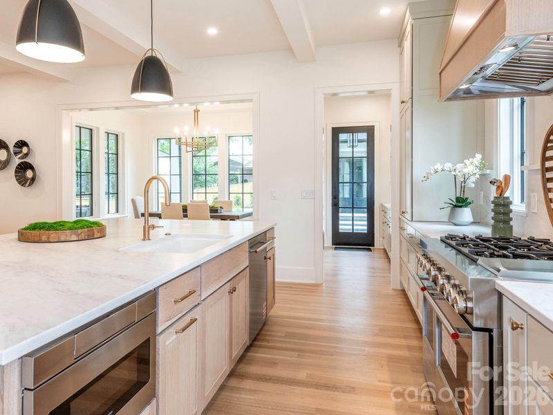 Kitchen opens to dining