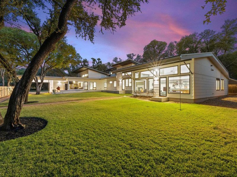 Rear view of property with a patio area
