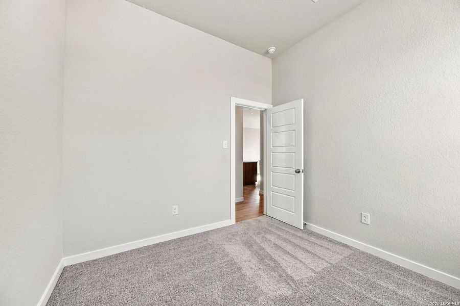 Spacious, unfurnished interior of a new home in Red Hawk Landing, San Antonio (Image 13).