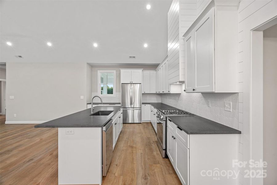 Furnished interior view inside a new home in , Harmony (Image 18).