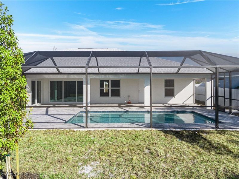 Front exterior of a new home in Cape Coral, Cape Coral, FL, highlighting curb appeal (Image 2).